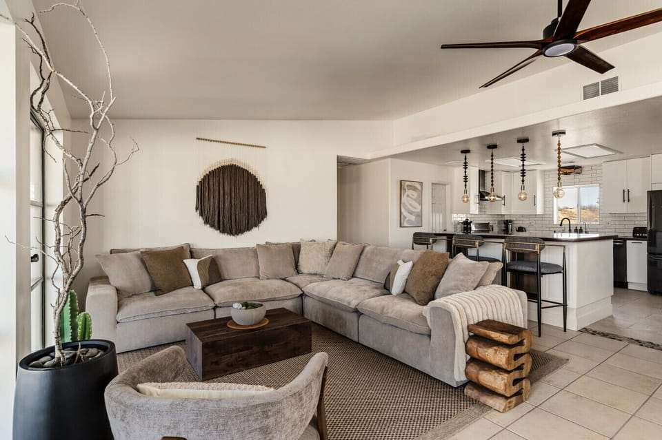 Gather on the spacious sectional with the kitchen close by.
