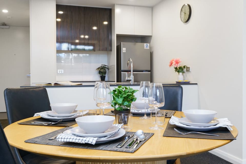 Thoughtfully presented dining area with a modern touch, creating the perfect setting for shared meals and good company.