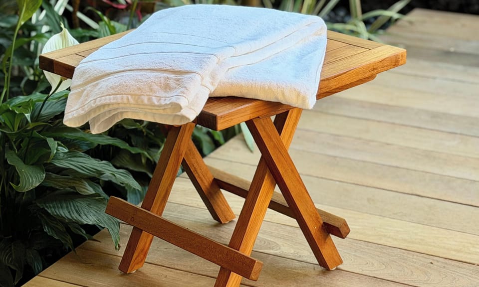 Fresh towels and Hawaiian air await - your perfect spot to unwind and recharge in a serene, nature-inspired setting.