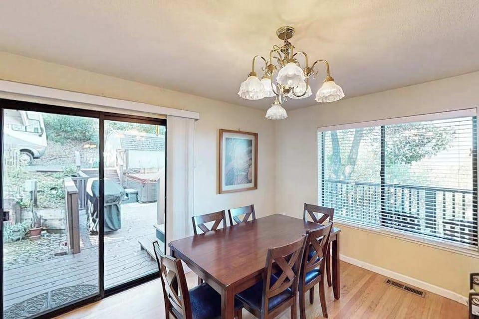 Share farm-to-table takeout around your six-seat dining table with vineyard-country views through the sliding glass doors — wine country dining starts at home.