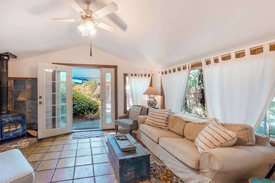 Bright and airy, your vaulted living room opens directly onto the patio through French doors — a sun-drenched base for exploring Russian River wine country.