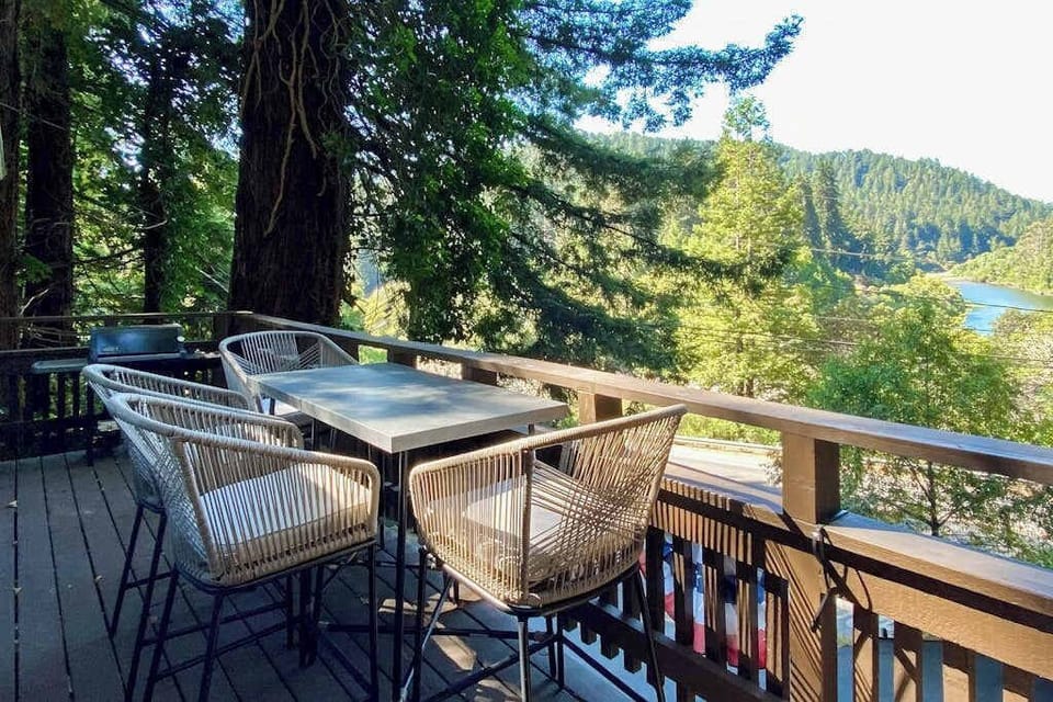 Pull up a wicker chair and dine alfresco on your sun-dappled deck — redwood branches arch overhead while the Russian River glimmers through the trees.
