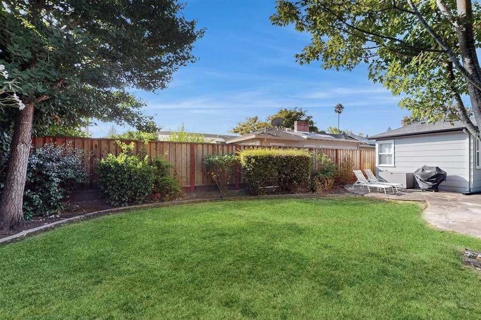 Fire up the grill on a sun-drenched lawn surrounded by privacy fencing — your enclosed yard is perfect for kids to play or a quiet afternoon with a Sonoma red