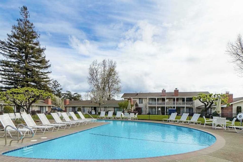 Cool off in the sparkling resort pool after a warm Napa Valley afternoon — sun loungers line the deck so you can relax between laps and sips.