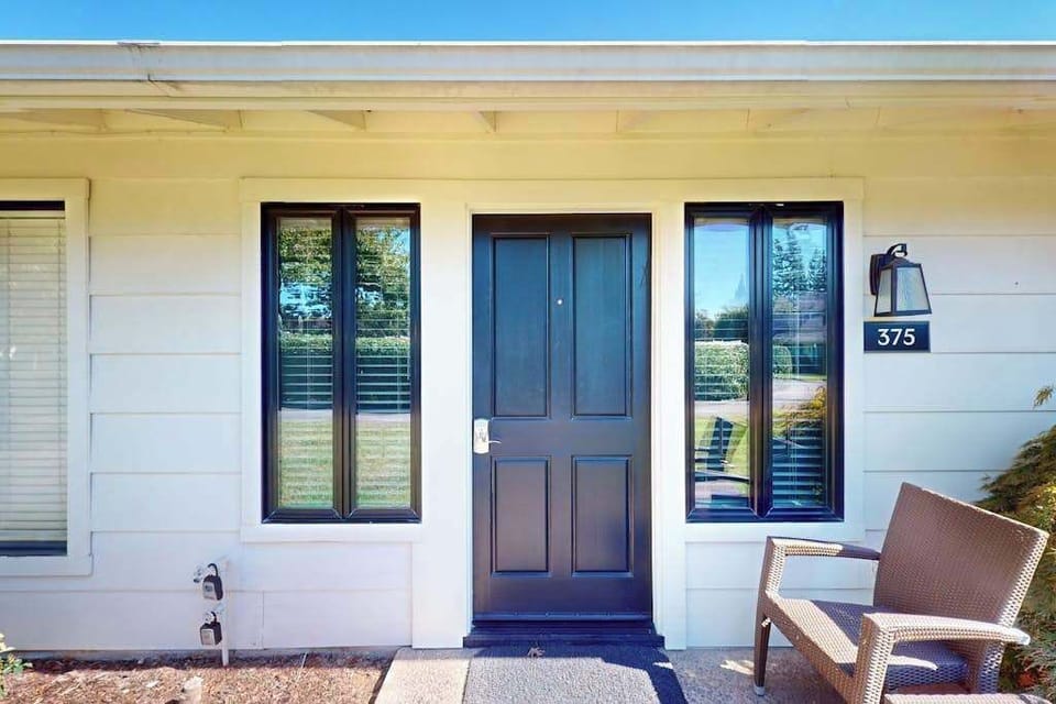 Your front door at Unit 375 — a classic Silverado Resort cottage entrance with outdoor seating where you can sip morning coffee steps from Napa's best.