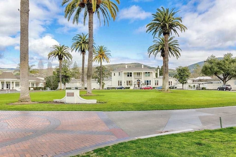 Marvel at Silverado's iconic palm-lined mansion — your Napa Valley resort carries over a century of wine country heritage