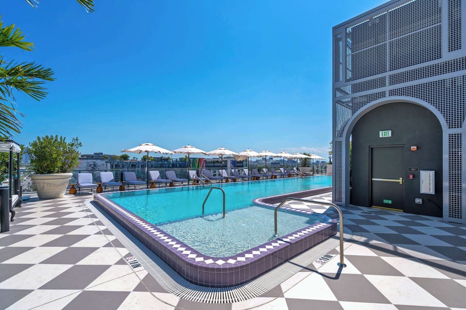 Take a dip or relax in the jacuzzi! The rooftop pool deck offers the perfect blend of relaxation and luxury, all with stunning Miami skyline views. 