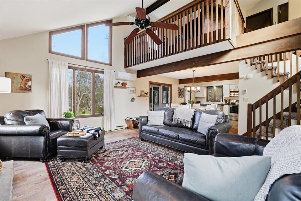 The open floor plan flows from the great room all the way up to the loft