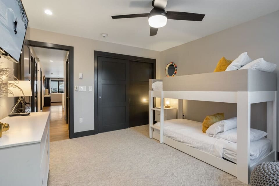 Bunk room with full sized beds and smart TV