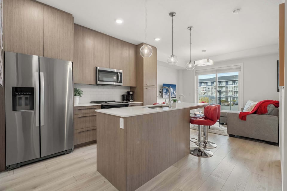 Modern open kitchen with full appliances