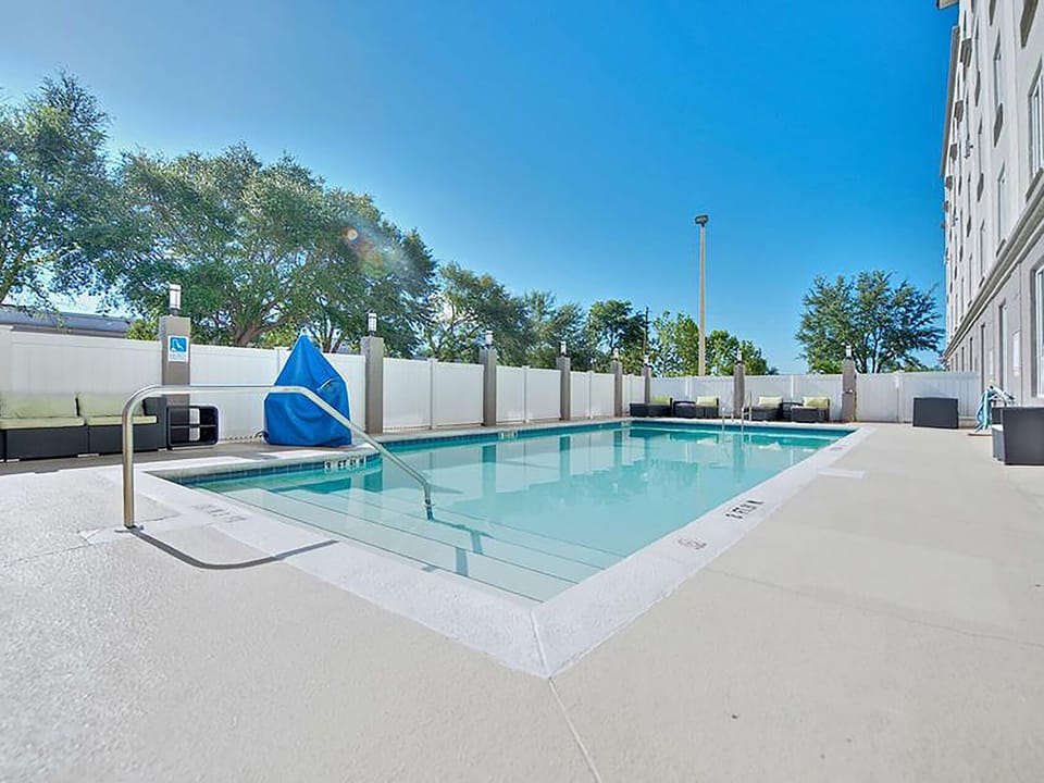 Stretch out poolside and soak up the open-sky calm.