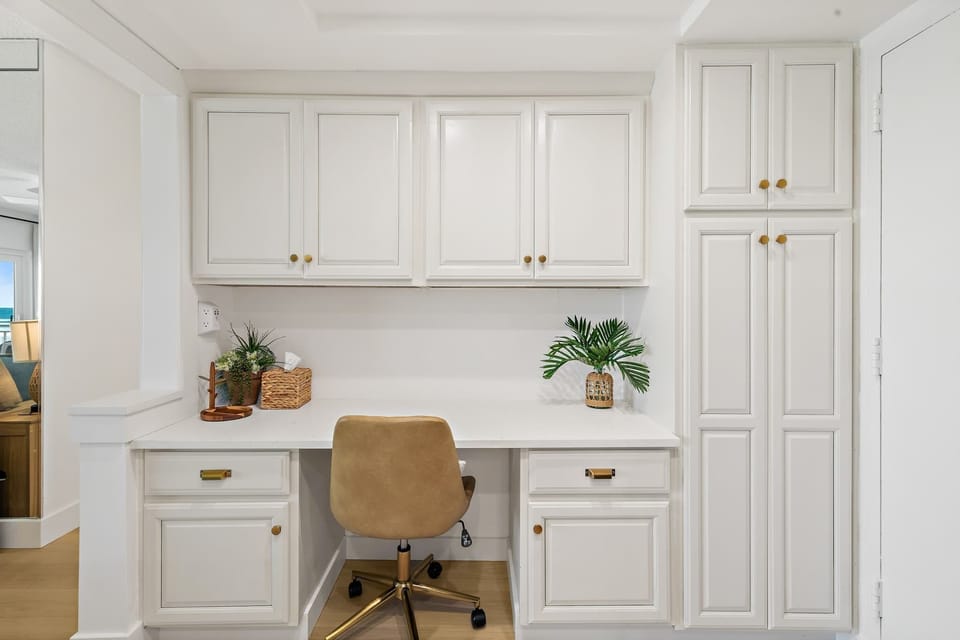 Built-In Desk Nook with White Cabinetry and Natural Light