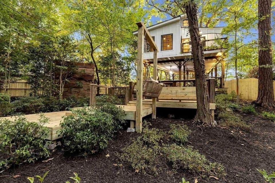 Bask in the private gardens, multiple deck spaces, and the spacious treehouse that is equipped with heating and a/c.