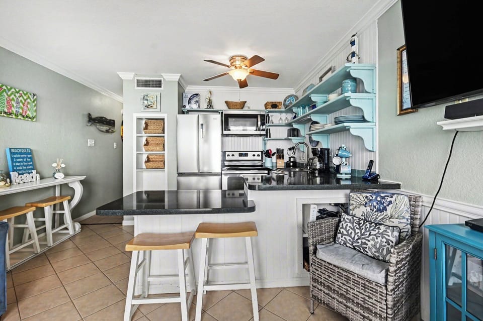 Another view of kitchen with seating for 4