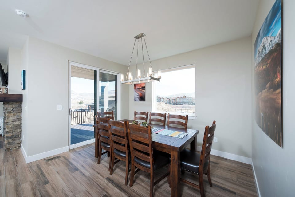Sunlit dining area with scenic views in every direction