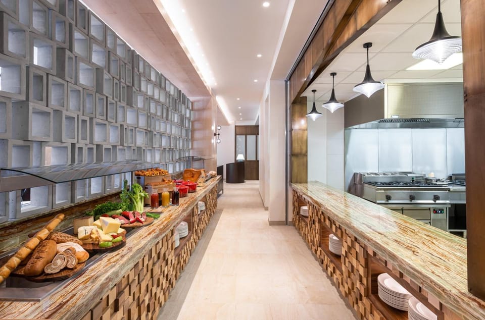 Indulge in a generous buffet spread with fresh morning favorites.