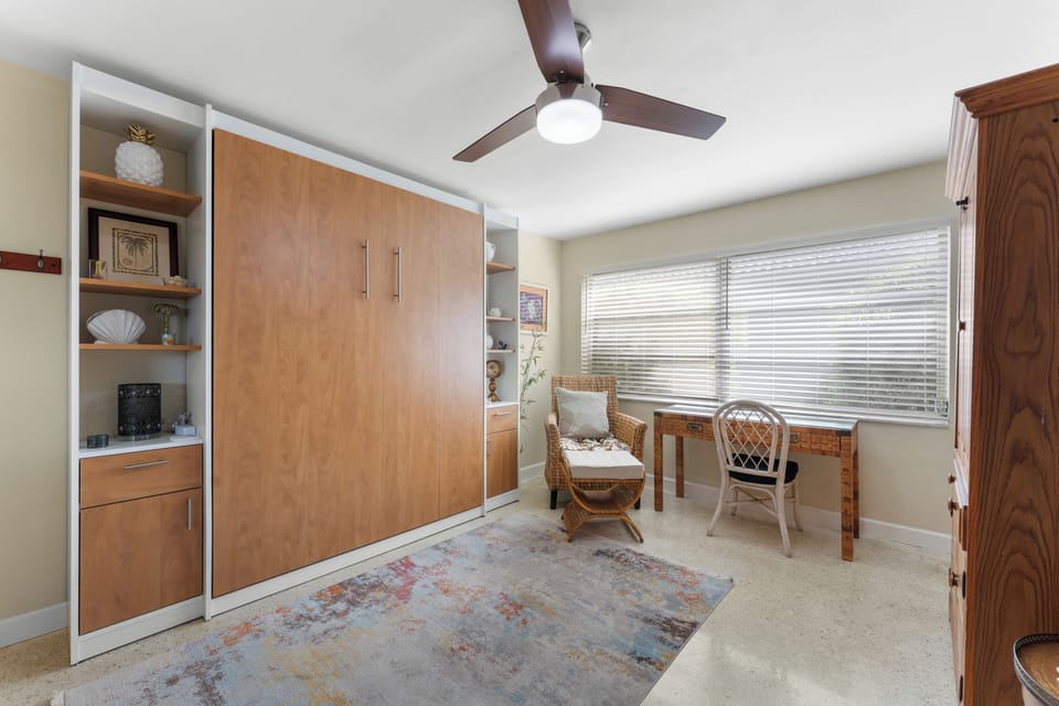Family room area with a Queen-sized Murphy bed to sleep an extra 2 guests