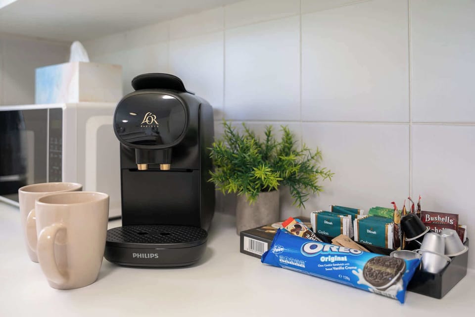 Kitchen comes complete with clothes laundry area and facilities - essential for longer term stays !