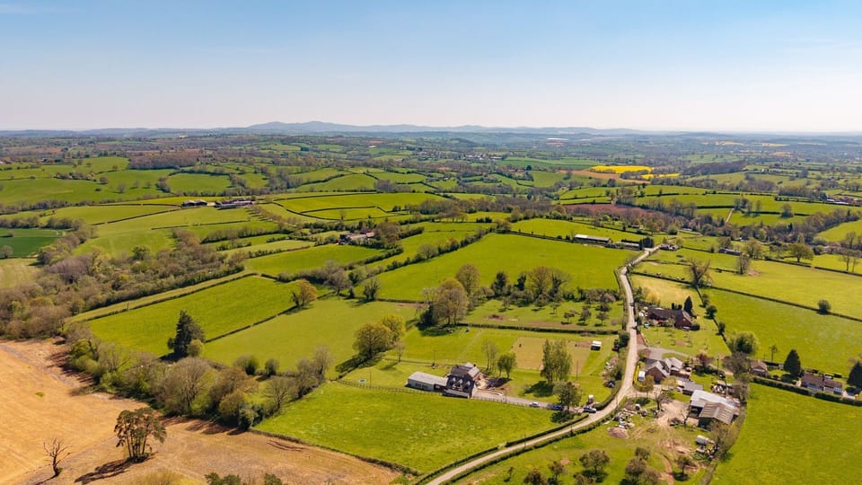 Surrounded by farmland and rolling hills for miles