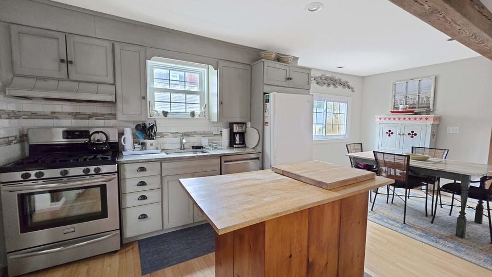 Kitchen has a center island for additional workspace