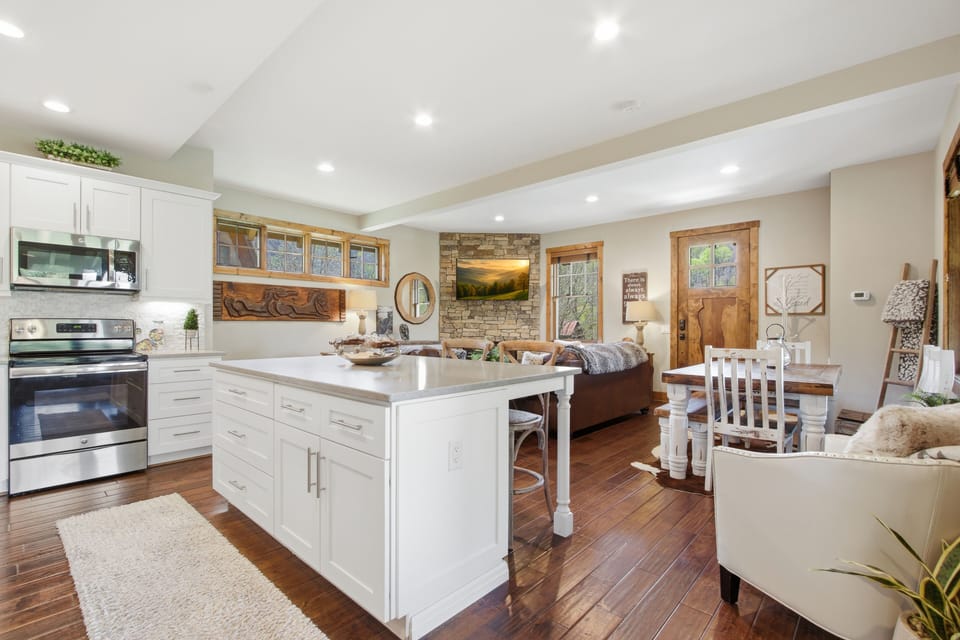 Gourmet kitchen with generous island and high-end finishes throughout.