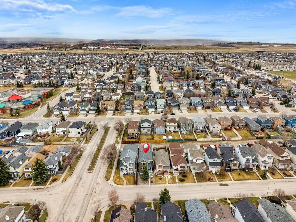Exterior of Salt Cove, located in Bridlewood in Calgary’s southwest. Known for its parks, walking paths, and nearby shopping, this area is ideal for longer stays, families, and guests travelling with pets.