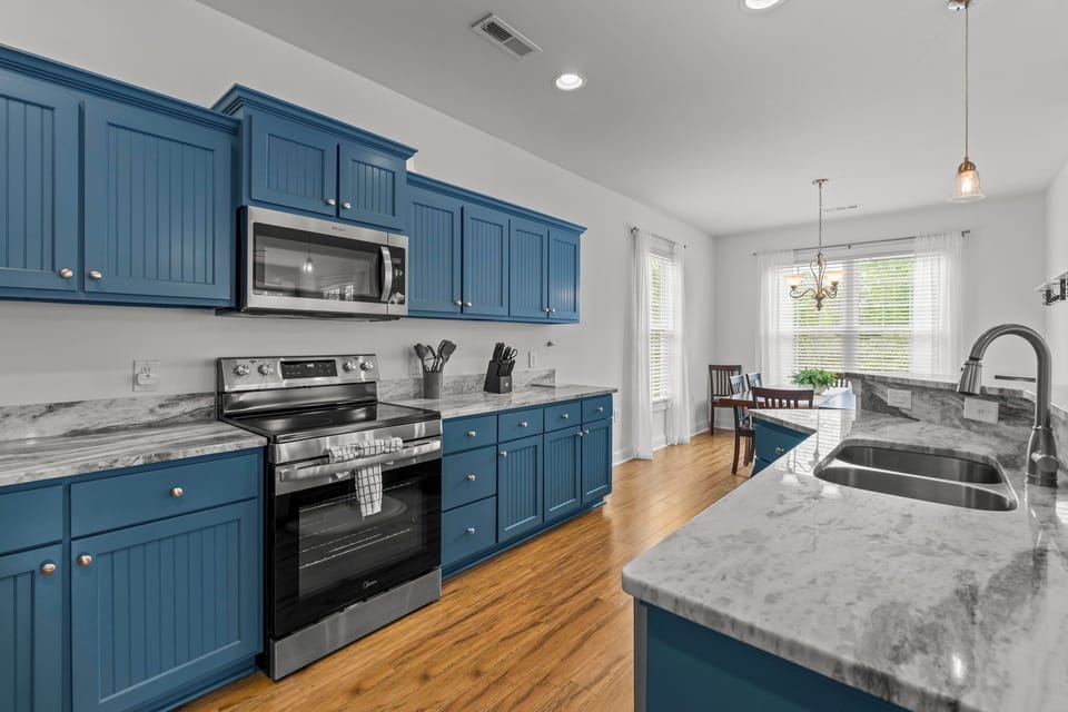 Enjoy cooking in the large kitchen with beautiful granite and stainless steel appliances