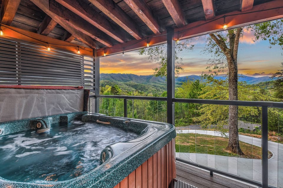 Private hot tub deck with stunning mountain sunset views