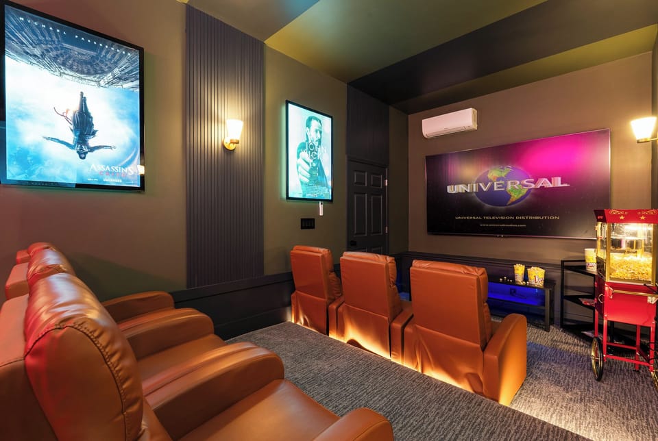 Private theatre room with plush seating - movie nights made easy after a day in downtown Asheville