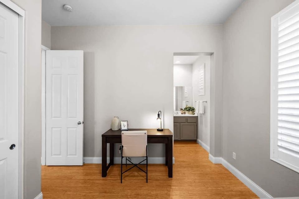 Bedroom 3: It includes a dedicated workspace, making it easy to stay productive, catch up on emails, or focus on studying with an attached bathroom for comfort and privacy.
