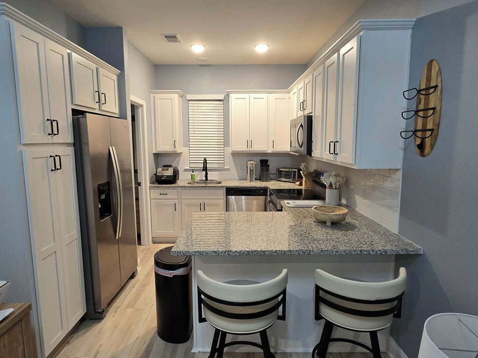 Nicely Updated Kitchen and with provided Kitchen Essentials that you might need for your stay.