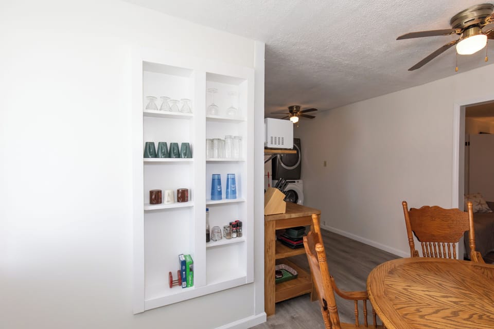 Glassware, dishes, and coffee supplies stocked and easy to find