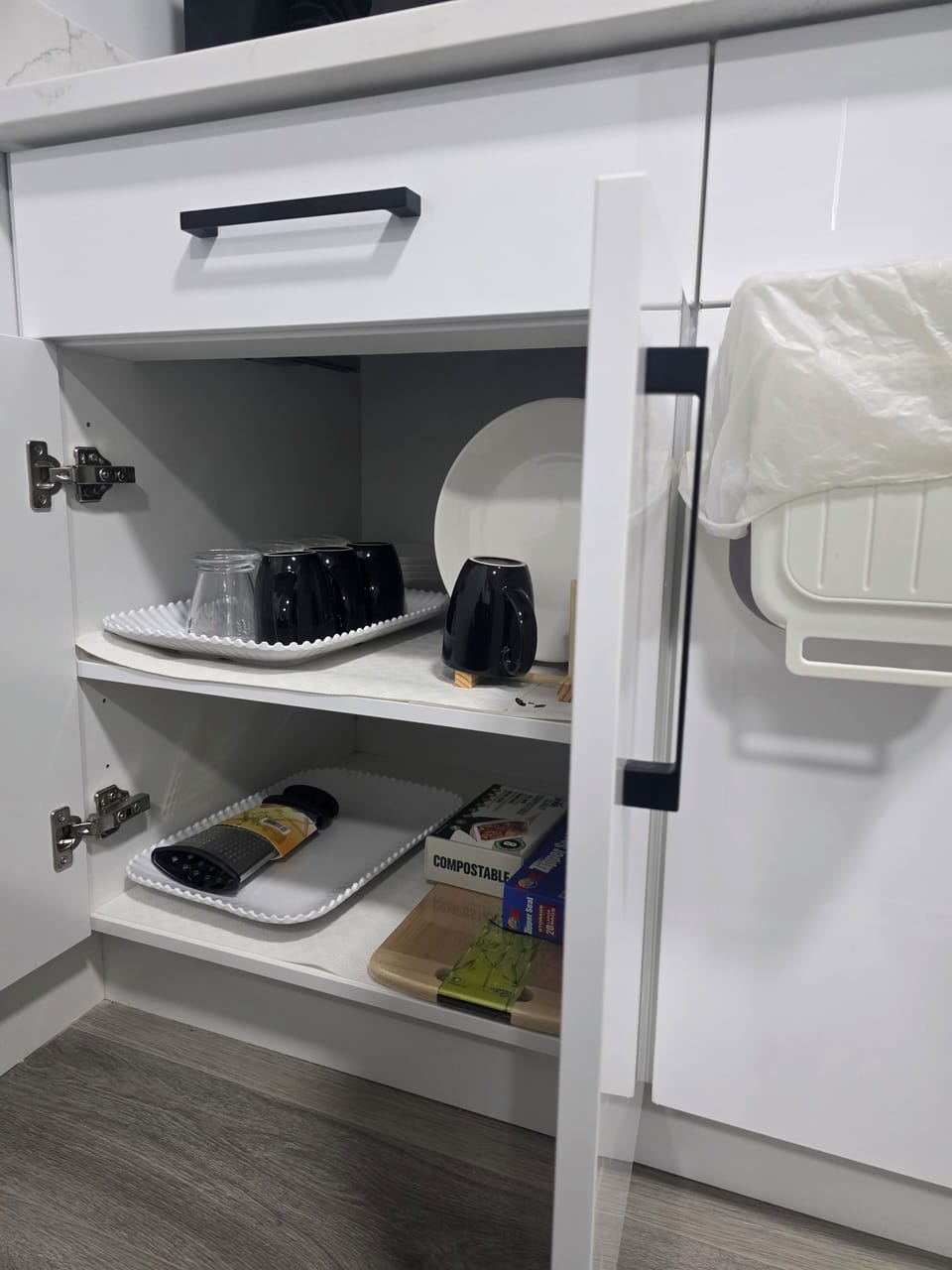kitchen essentials: Grater, trays, glass cups, mugs, plates, garbage bags ziploc