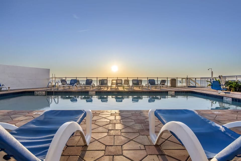 Soak in sunrise serenity from the sparkling oceanfront pool deck.