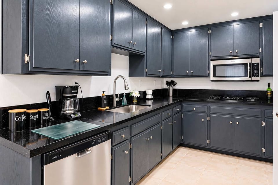 ☕ A well-stocked coffee station and full counter space—everything ready for a slow morning or a quick one