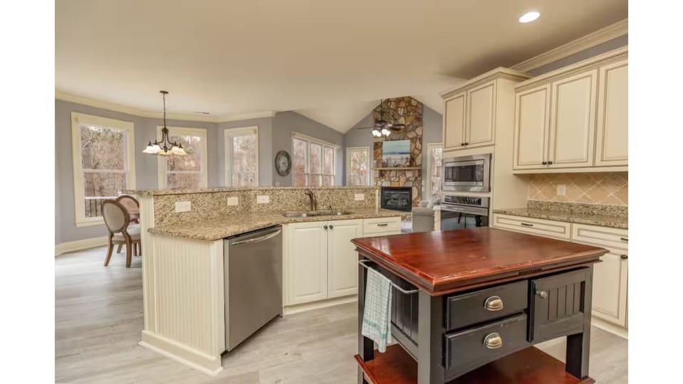 Fully equipped kitchen with bar seating.