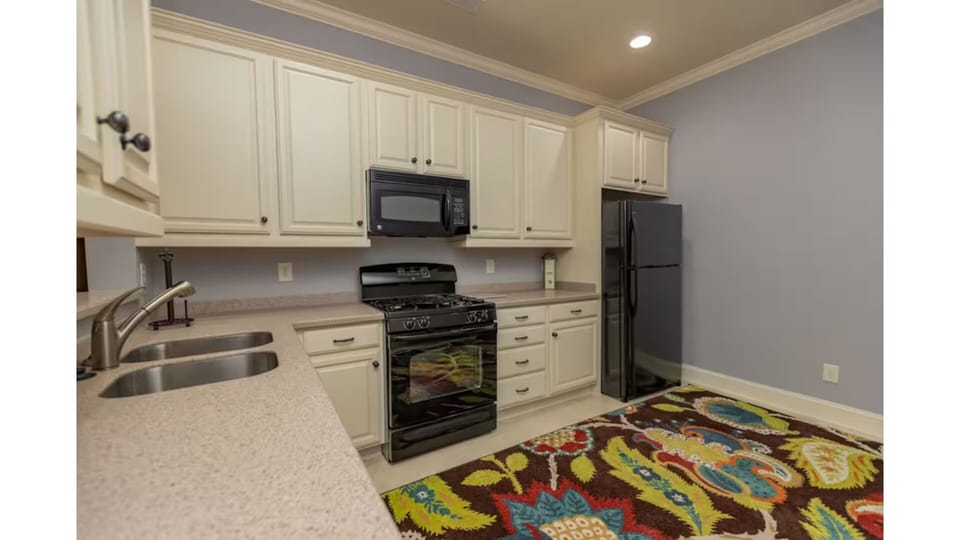 Stove, microwave, dishwasher, full fridge