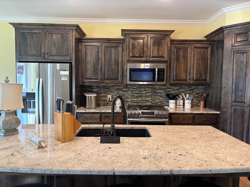 A true Chef's Kitchen with HexClad pots/pans with stocked Pantry and Coffee Bar