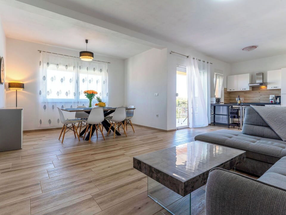 Flooring, Furniture, Wood, Wood Flooring, Interior Design, Floor, Home, Ceiling, Apartment, Couch
