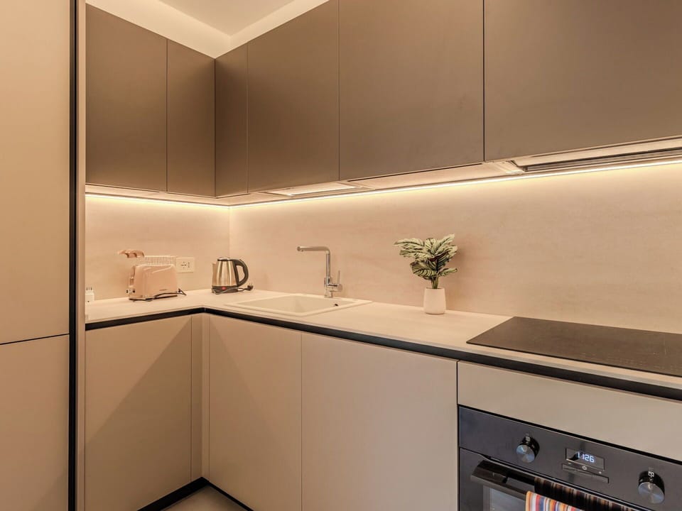 Kitchen, Interior Design, Countertop, Cabinetry, Kitchen Appliance, Ceiling, Kitchen Stove, Light Fixture, Major Appliance
