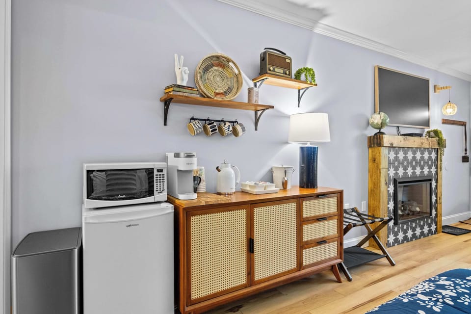 Coffee bar stocked and ready. Mugs, filters, and the essentials all within reach.