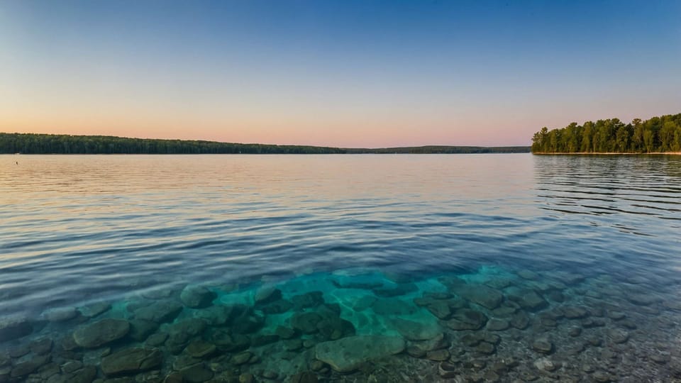 Torch Lake's turquoise water, just minutes from the cabin