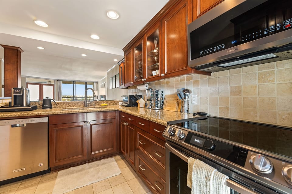 Newer range + microwave + supplies to cook at home
