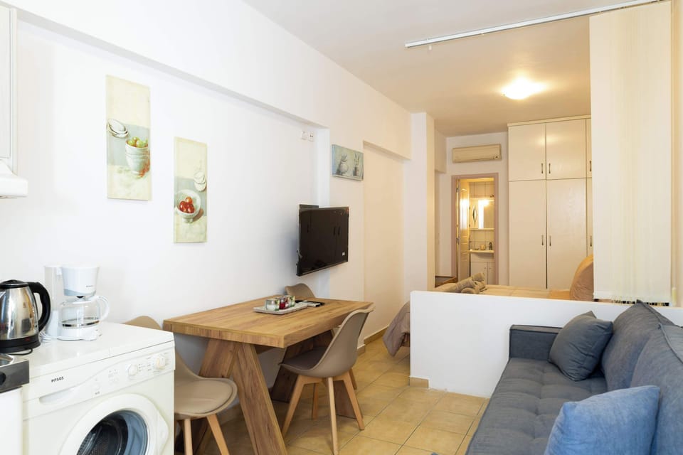 Open-plan living room with kitchen and dining area
