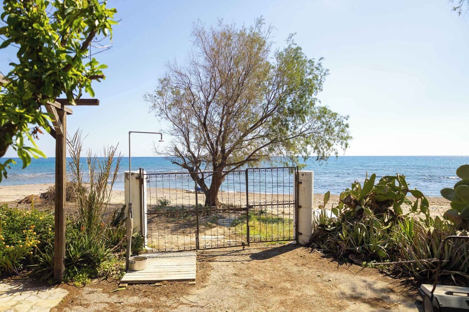 Charming seaside garden path leading directly to the beach