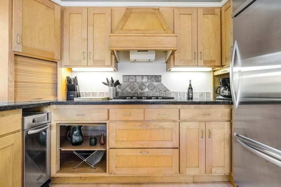 Cook like a local with your fully equipped gourmet kitchen featuring a gas range, stainless steel appliances, and ample counter space for Sonoma farmers market hauls.