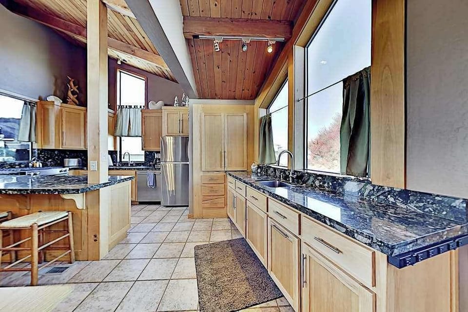 Ample counter space and custom cabinetry make this galley-style kitchen your Bodega Bay culinary headquarters — perfect for crab feasts and wine-country charcuterie.