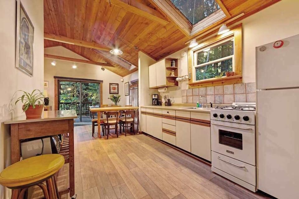 Prepare farm-to-table meals in your fully equipped kitchen with a gas stove, full-size refrigerator, and ample counter space.