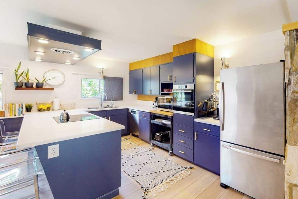 Every culinary tool you need awaits — stainless steel appliances, generous counter space, and a fully stocked kitchen let you craft the perfect Sonoma County wine-pairing dinner.
