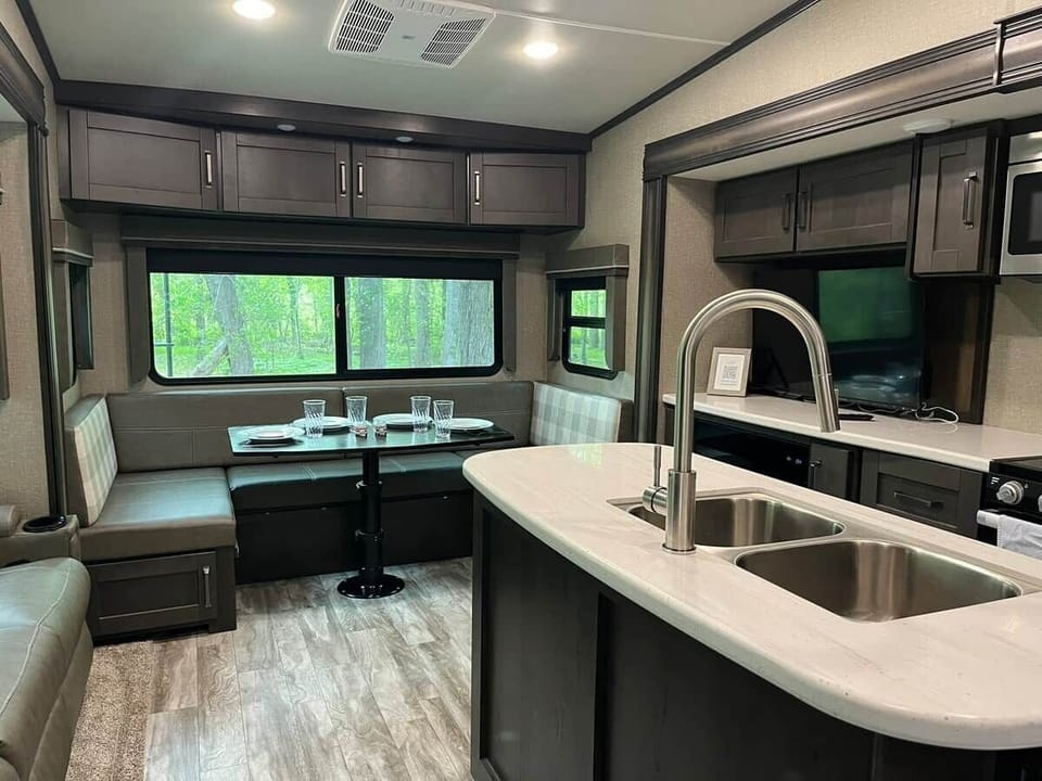 Open kitchen and dining space inside The Mountain Nook in Townsend